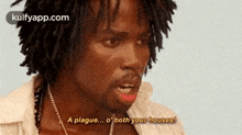 a man with dreadlocks is saying a plague ... o both your houses !