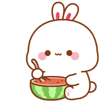 a rabbit is eating watermelon with a spoon .