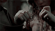 Spinning Magic Necklace Compass GIF