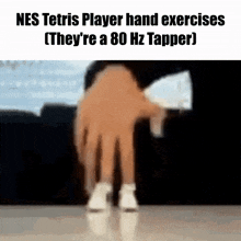 a tetris player is doing hand exercises with a 80 hz taper