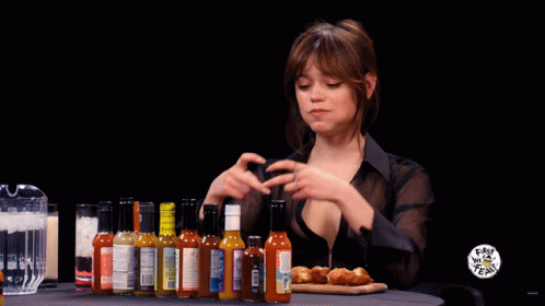 Jenna Ortega Hot Ones GIF - Jenna Ortega Hot Ones Hand Heart - Discover &  Share GIFs