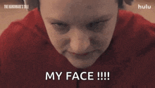 a close up of a person 's face with the words `` my face !!! '' .