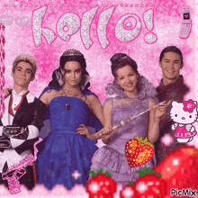 a group of people posing for a picture with hello kitty
