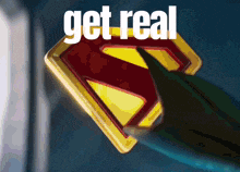 a superman logo with the words get real written below it