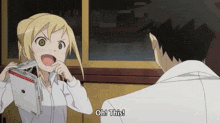 a man and a girl are talking and the girl is holding a book and saying oh this