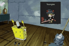 a cartoon of spongebob standing next to a picture of a boy with the name yoongies on it