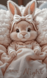 a picture of a baby rabbit with the words good night written on the bottom