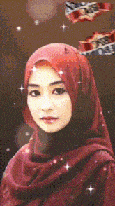 a woman wearing a red scarf and a hijab with the letter o on her head