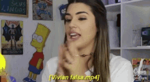 a woman with bart simpson on the wall behind her says vivian falsa mp4