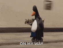 train penguin in a hurry im coming on my way