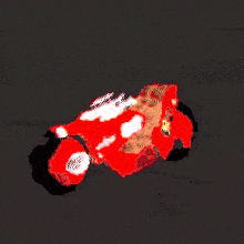 a pixel art drawing of a red motorcycle on a dark background