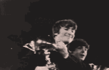 The Beatles Winning GIF - The Beatles Winning Award GIFs