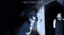 a dark room with the words i have a terrible feeling on it