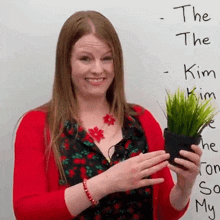 Looking At The Plant Emma GIF - Looking At The Plant Emma Engvid GIFs