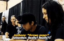 Sebastian Stan Anthony Mackie GIF - Sebastian Stan Anthony Mackie Throws Paper GIFs