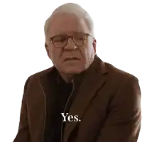 a man with glasses and a brown jacket says yes