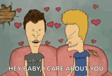 beavis and butthead are sitting next to each other on a couch holding hands .