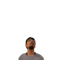 a man is looking up at the number 12