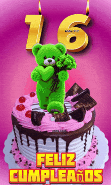 a green teddy bear holding a bouquet of flowers on top of a cake that says feliz cumpleanos