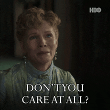 a woman says " don 't you care at all " with a hbo logo in the background