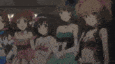 a group of anime girls are posing for a photo