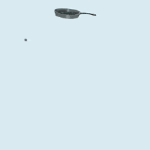 a blue background with the words happy birthday and a frying pan in the background