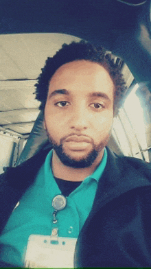 a man with a beard is wearing a name tag that says ' amanda ' on it