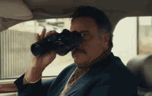 Brad Garrett Binoculars GIF - Brad Garrett Binoculars Spying GIFs