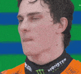 a man with a monster energy shirt on