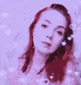 a woman with red hair is surrounded by hearts and a purple background