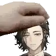 a hand is putting a blanket on a man 's head .