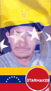 a man wearing a yellow hat with a starmaker logo
