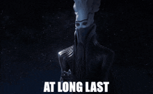 a picture of a monster with the words at long last written on it