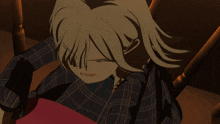a close up of a person 's face with their eyes closed