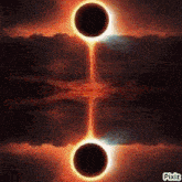 a partial eclipse of the sun with two black holes in the middle of it .