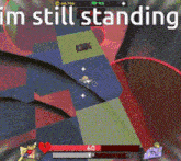 a screenshot of a video game with the words `` i 'm still standing '' above it .