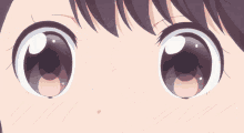 a close up of a cartoon girl 's face with a smile on her face