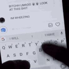 a person is typing on a cell phone with a message that says " bitch lmaoo at this shit "