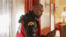 Answer The Phone Sheriff Mccoy GIF - Answer The Phone Sheriff Mccoy Dangerous GIFs