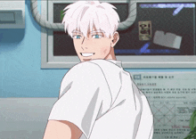 a man with white hair and blue eyes is smiling in front of a sign that says " in "