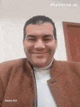a man in a brown coat is smiling in front of a galaxy a23 phone