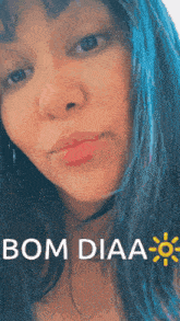 a close up of a woman 's face with the words bom diaa below her
