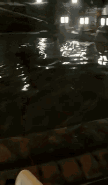 a close up of a person cooking food in a pan