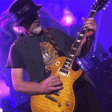 playing a guitar brad whitford aerosmith dream on song plucking the guitar strings