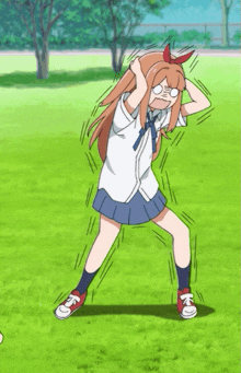 a girl in a white shirt and blue skirt is standing on a grassy field