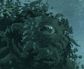 a painting of a monster with a large eye