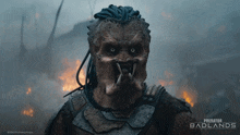 a poster for predator badlands shows a predator with dreadlocks