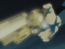 a hand is holding a gun in a dark room
