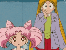 a girl with pink hair is standing next to a man with blonde hair
