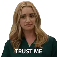 a woman in a green scrub top has the words trust me written on her face